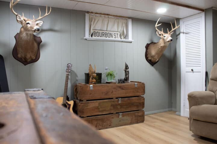 small man cave affordable ideas for basement , green paint, deer heads