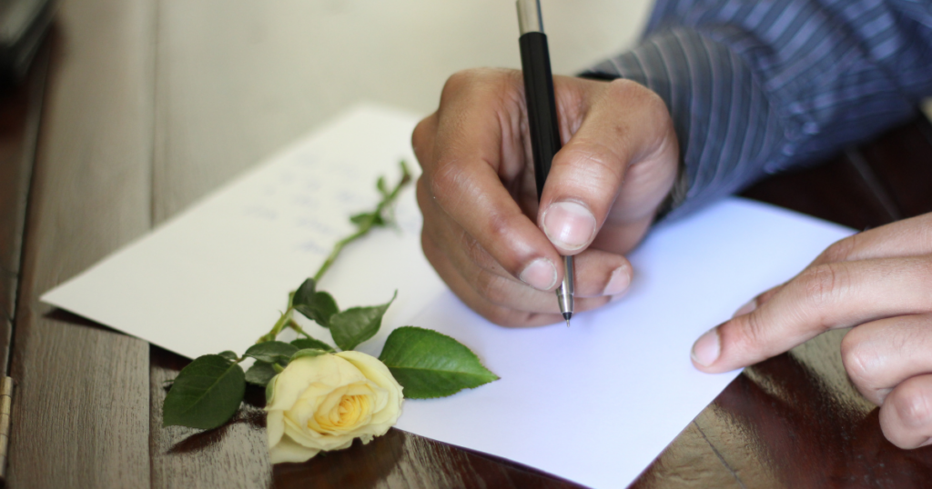 loveletters-1024x538-2 hands writing a love letter